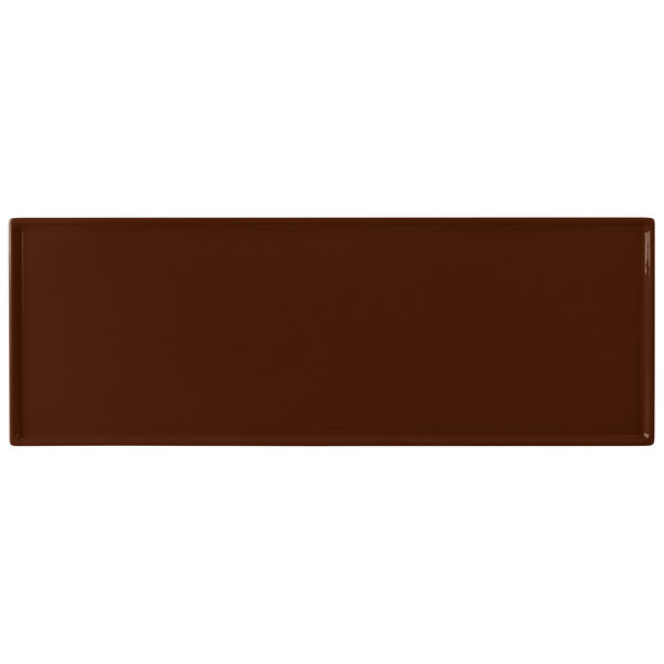 A brown rectangular Tablecraft cast aluminum cooling platter.