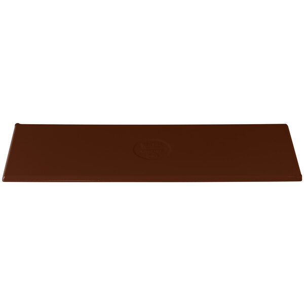 A brown rectangular cast aluminum platter with a brown surface.
