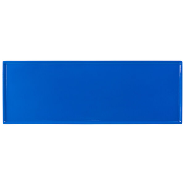 A cobalt blue rectangular cast aluminum cooling platter with a white border.