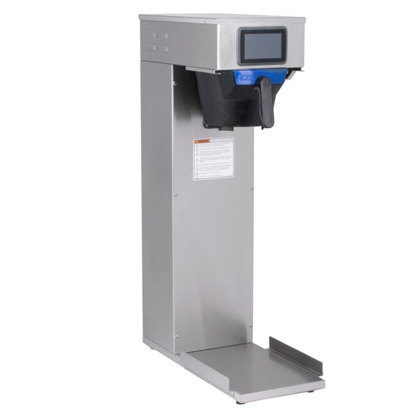 A silver rectangular Curtis iced tea brewer with a screen.