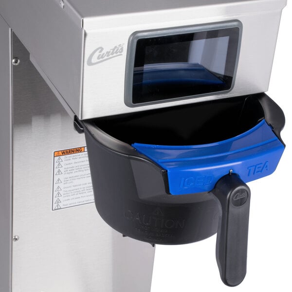 A Curtis 3-5 gallon tea brewer with a black and blue lid and handle.