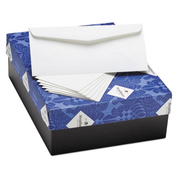 A blue box with white Strathmore business envelopes.