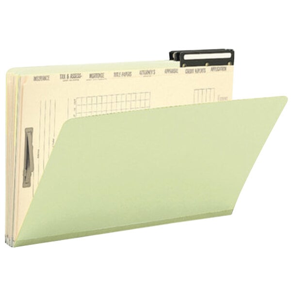 A green Smead legal size file folder with a black metal tab.