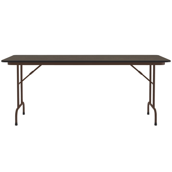 A Correll walnut folding table with black legs and a black top.
