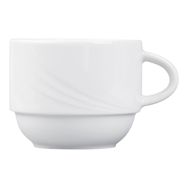 A plain white porcelain cup with a handle and subtle curved detailing on its surface.