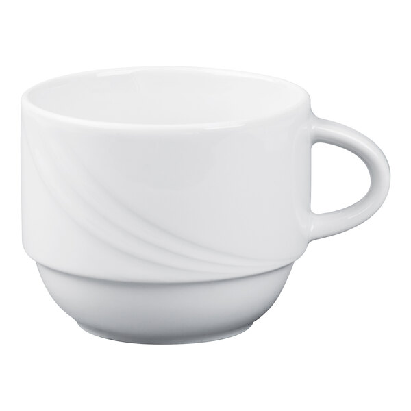 A white porcelain cup with a handle and subtle curved line detailing on its side.