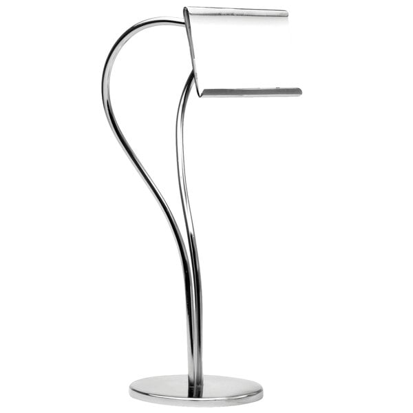 A chrome Clipper Mill S-shaped card holder on a counter.