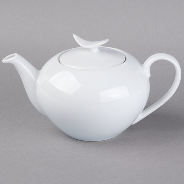 A white Schonwald porcelain teapot with a lid.