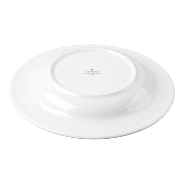 A white porcelain bowl shown upside down, displaying its smooth surface and a small printed logo or text at the center of the base.
