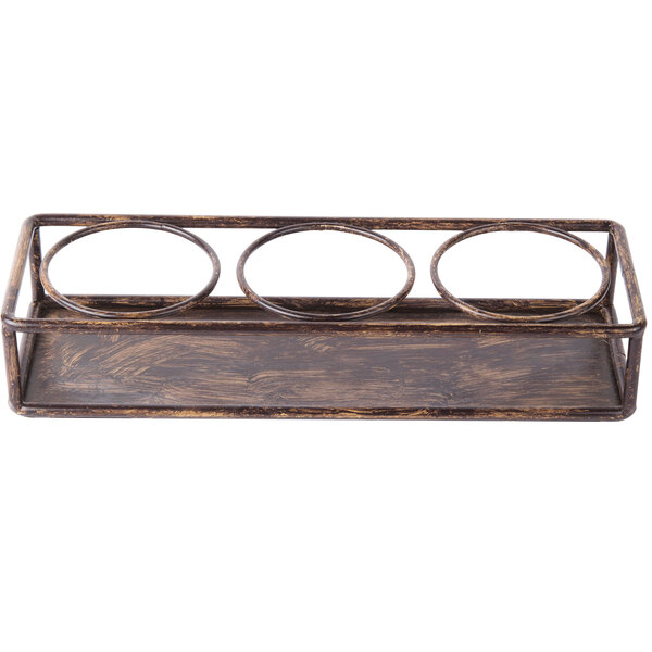 A Clipper Mill powder coated iron rectangular condiment stand with three metal rings on it.