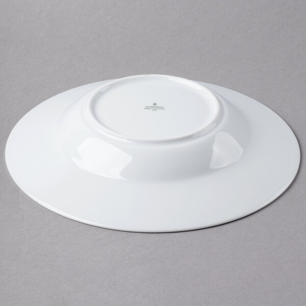 A white Schonwald round porcelain bowl with a white rim.