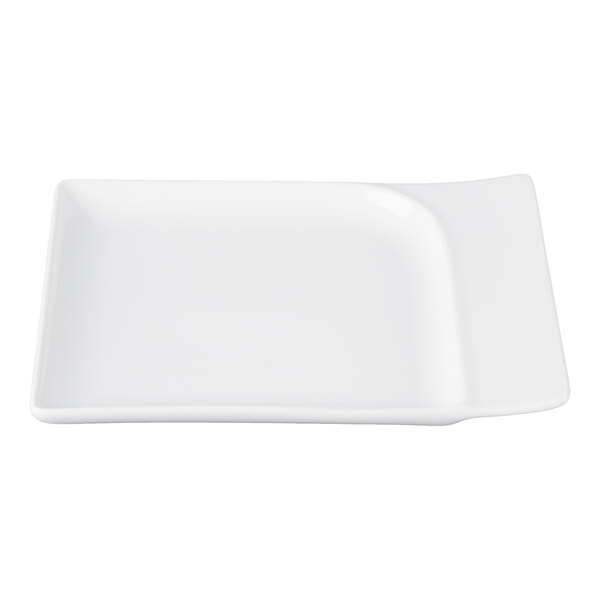 A rectangular white porcelain platter with slightly curved edges and a smooth, glossy finish.