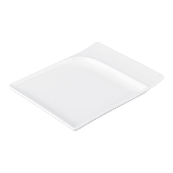 A rectangular white porcelain platter with a contoured design and slightly raised edge on one side.
