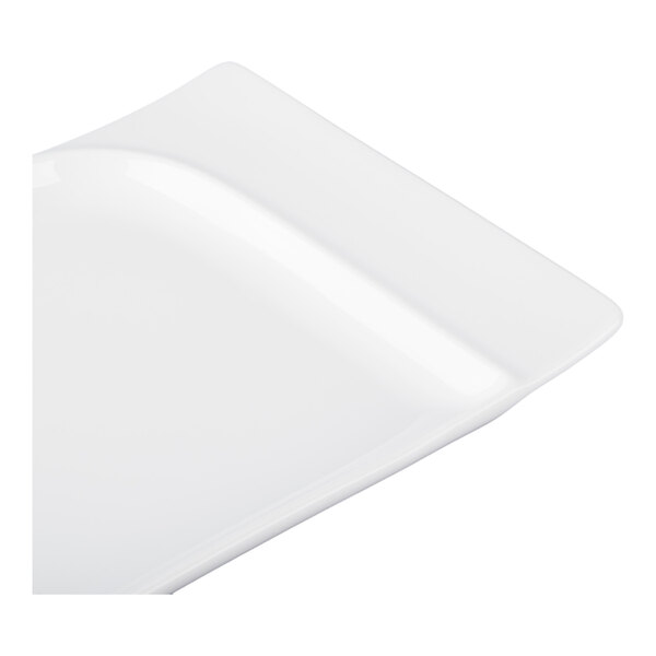 A close-up of a white, rectangular, contoured porcelain platter.