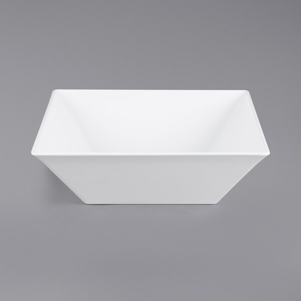 A white square bowl on a gray background.
