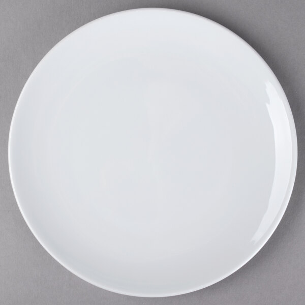 A Schonwald white porcelain coupe plate with a round rim.