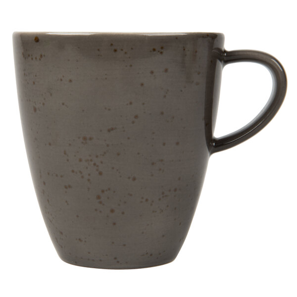 A dark gray Schonwald porcelain cup with a handle.