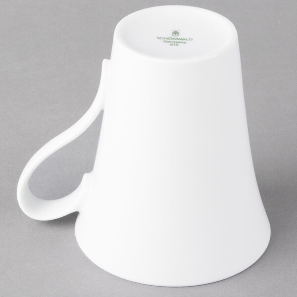 A Schonwald white porcelain mug with a handle.