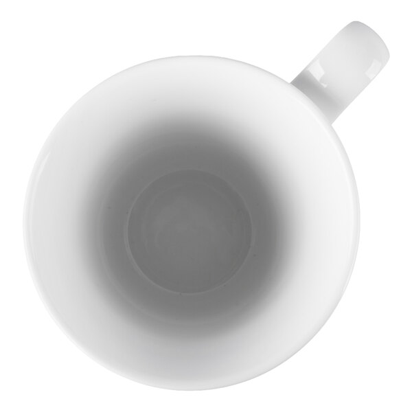 A top-down view of a plain white cup with a handle.