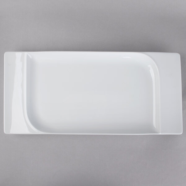A white rectangular Schonwald porcelain platter with a small rim.