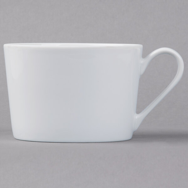 A Schonwald white porcelain coffee cup with a handle.