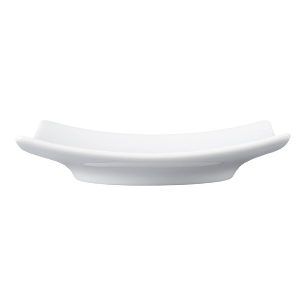 A white, square-shaped porcelain saucer with slightly upturned edges, shown from a side view.