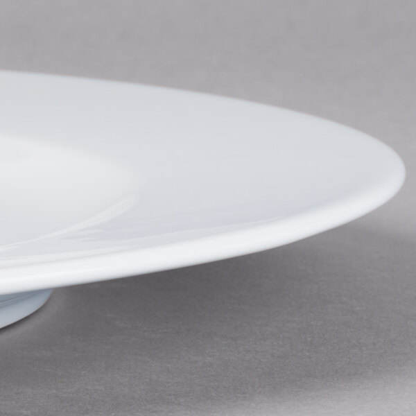 A Schonwald white porcelain plate with a small rim.