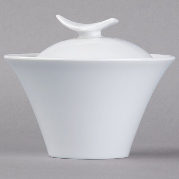 A Schonwald white porcelain sugar bowl with a lid.