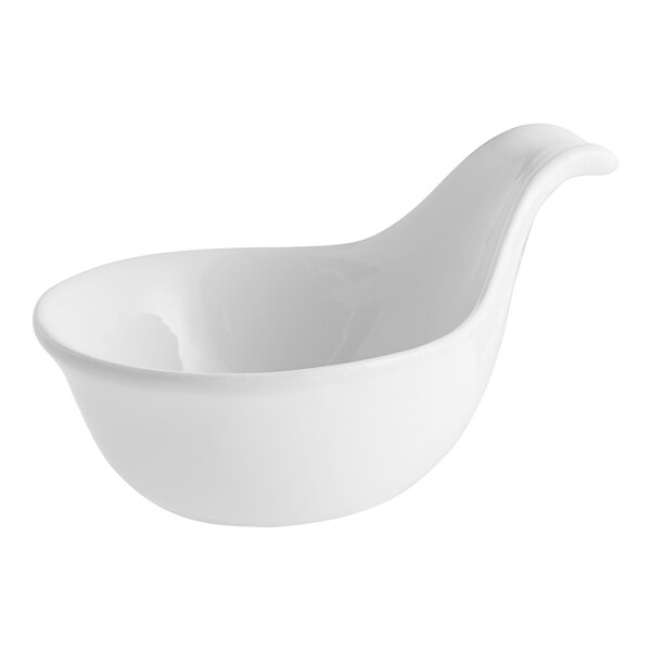 A white porcelain spoon with a curved handle.