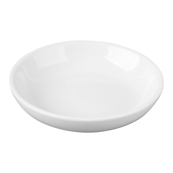 A small, round, bright white porcelain sauce or sake cup.