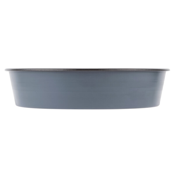 A Matfer Bourgeat non-stick round cake pan with a black rim.