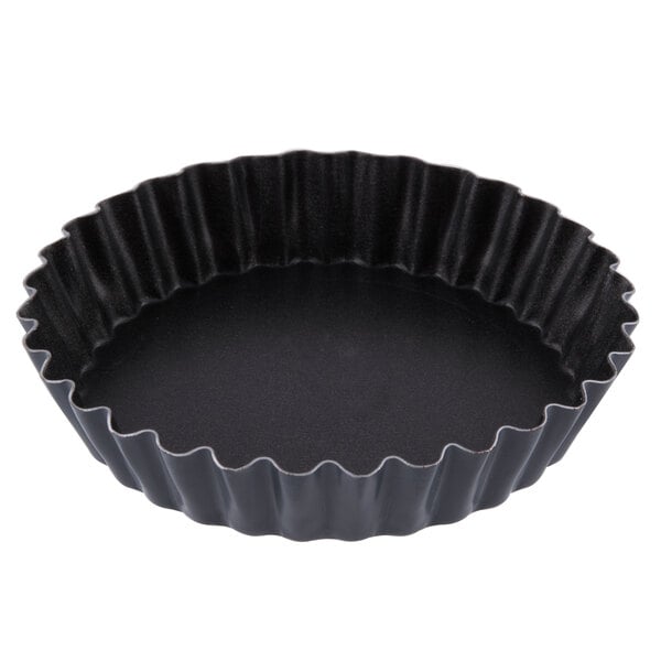 A black fluted Matfer Bourgeat tart pan.