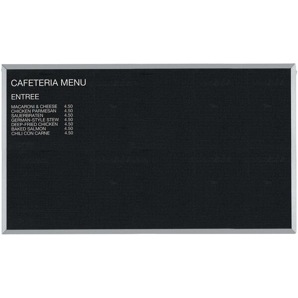 A black menu board with white text.