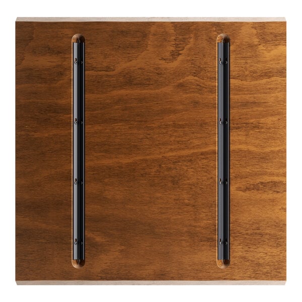 A Lancaster Table & Seating live edge wood table top with a rustic walnut finish.