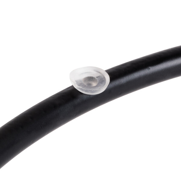 A close-up of a black metal Libbey display frame with rubber on a cable.