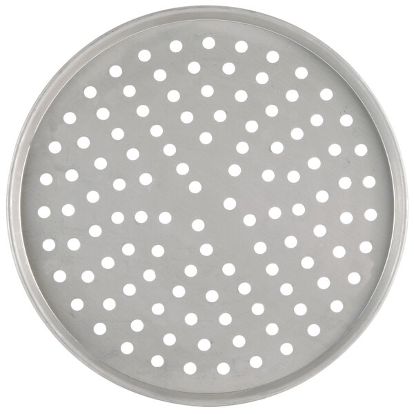 a circular metal tray with holes