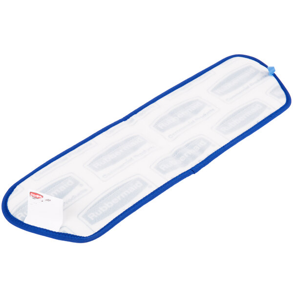 A blue and white rectangular Rubbermaid cleaning pad with text on it.