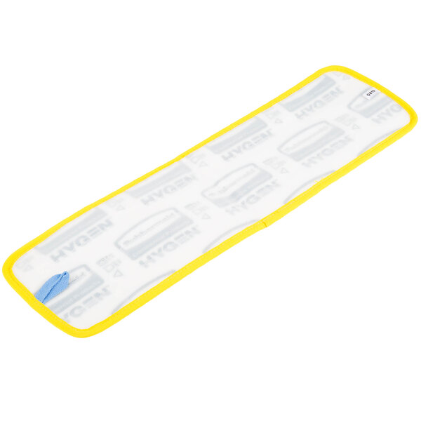 A white and yellow Rubbermaid HYGEN microfiber wet mop pad with a blue hook and loop attachment.