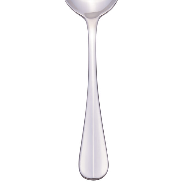 A Libbey stainless steel bouillon spoon with a silver handle.
