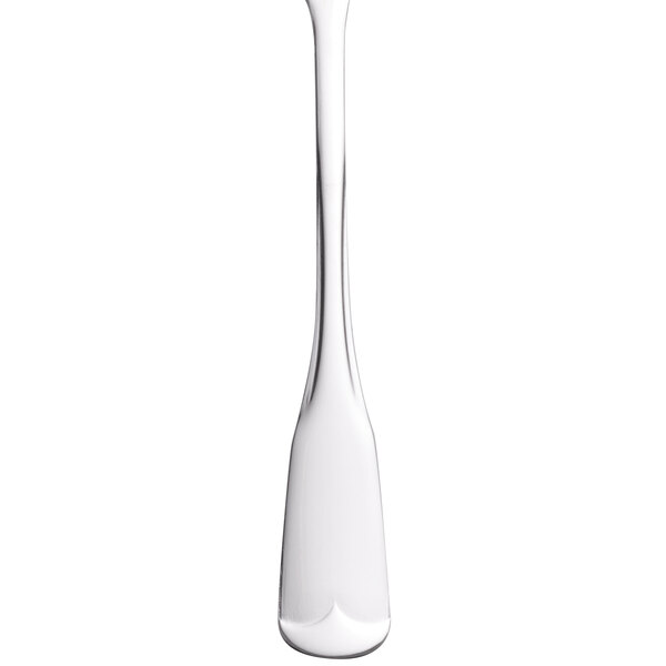 A World Tableware stainless steel teaspoon with a white handle.