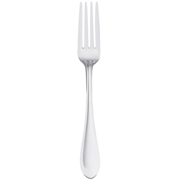 A silver Libbey European dinner fork with a white handle.
