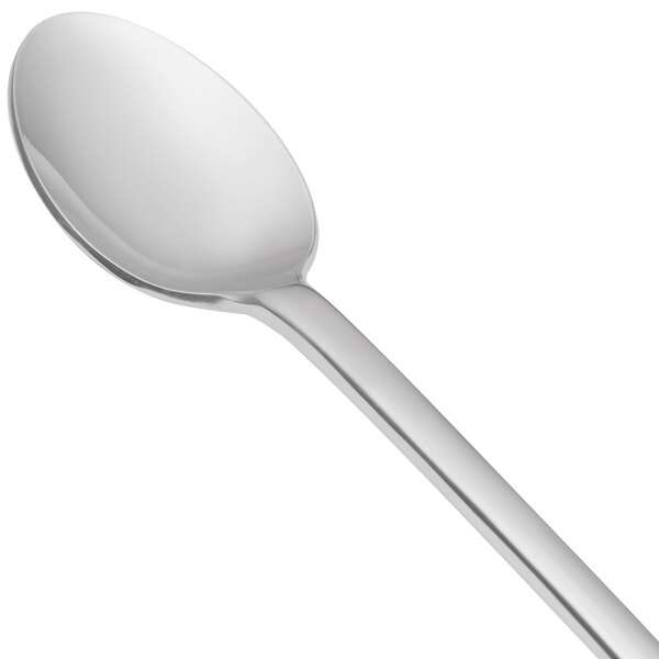 A close-up of a Libbey stainless steel spoon with a silver handle.