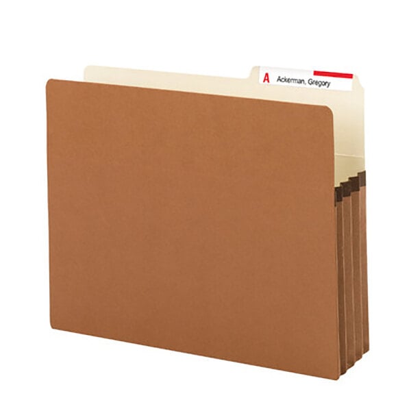 A brown file folder with a white label.