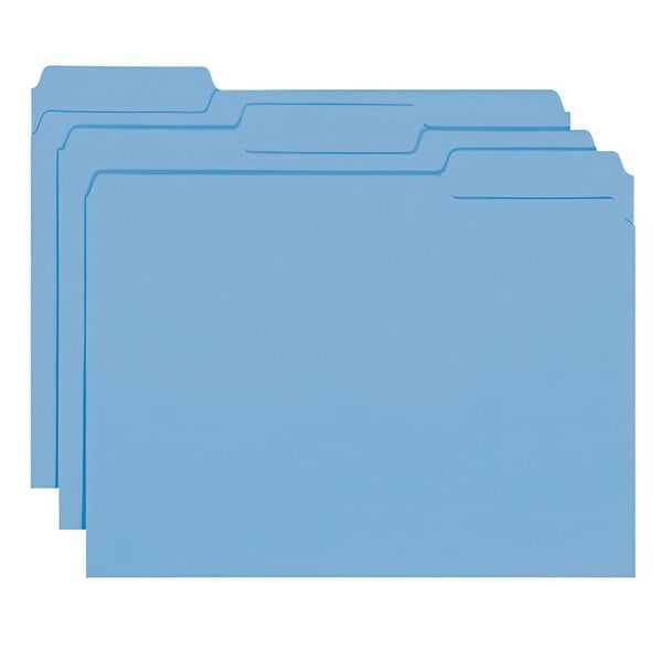 A group of blue Smead file folders with 1/3 cut assorted tabs.