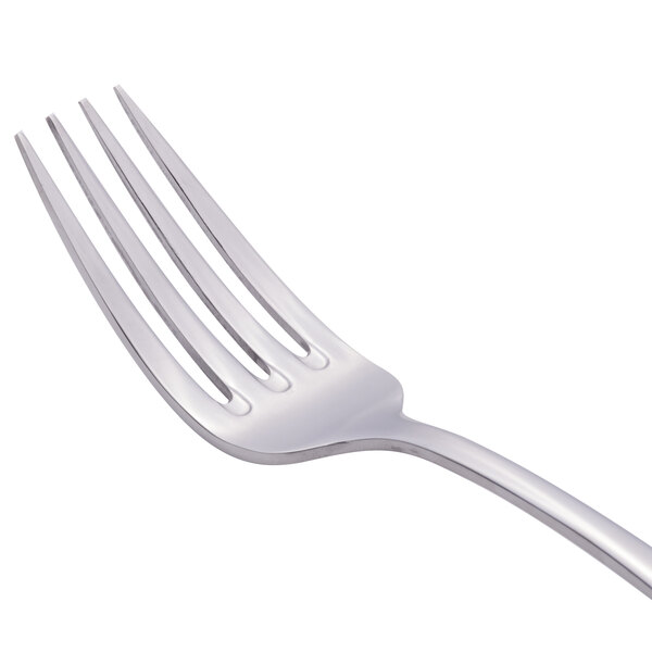 A Libbey stainless steel dinner fork with a silver handle.