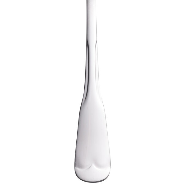 A World Tableware stainless steel utility / dessert fork with a white handle.