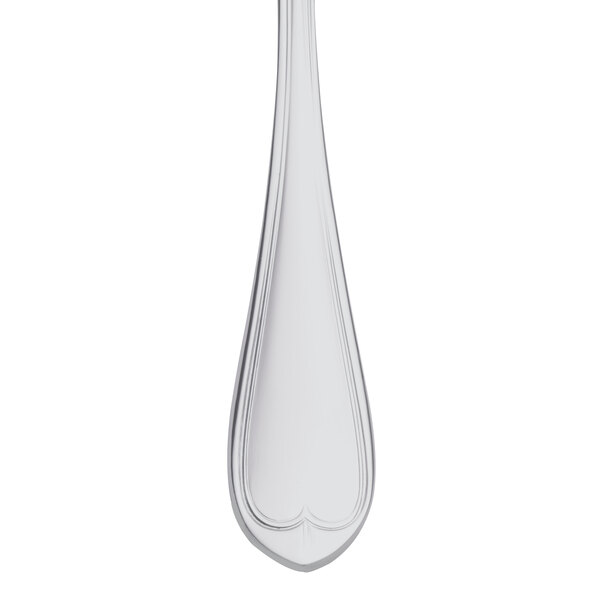 A Libbey stainless steel dessert spoon with a heart shaped handle.