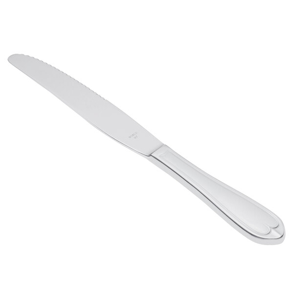 A Libbey stainless steel dinner knife with a fluted solid handle.