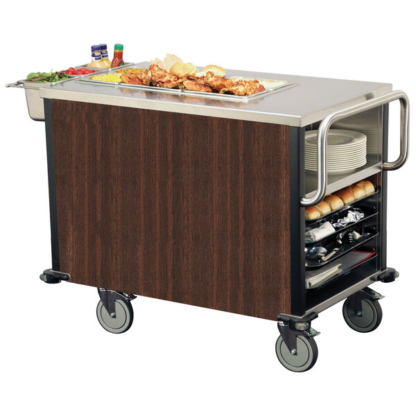 A Lakeside dining room meal serving system on a food cart with a tray of food on it.