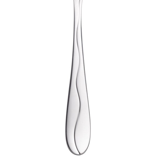 A close-up of a Libbey stainless steel bouillon spoon with a curved handle.